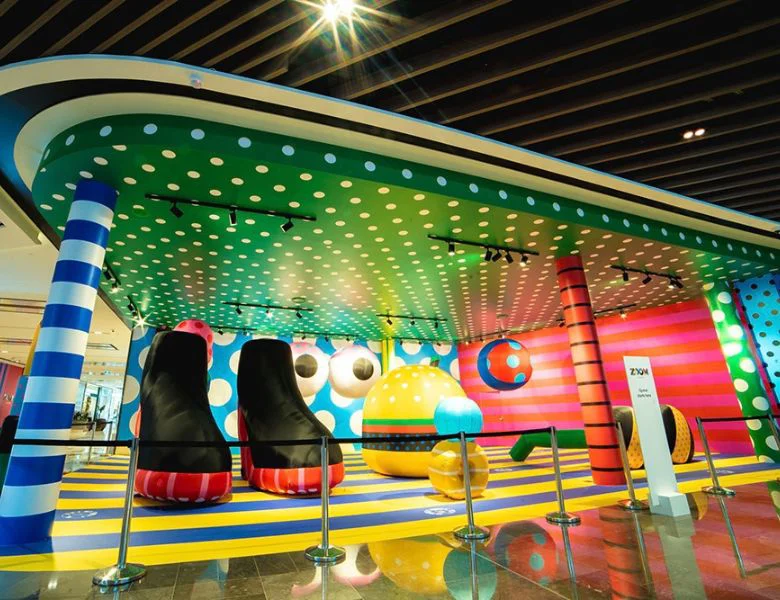retail event with colorful signage with stripes and polka dots