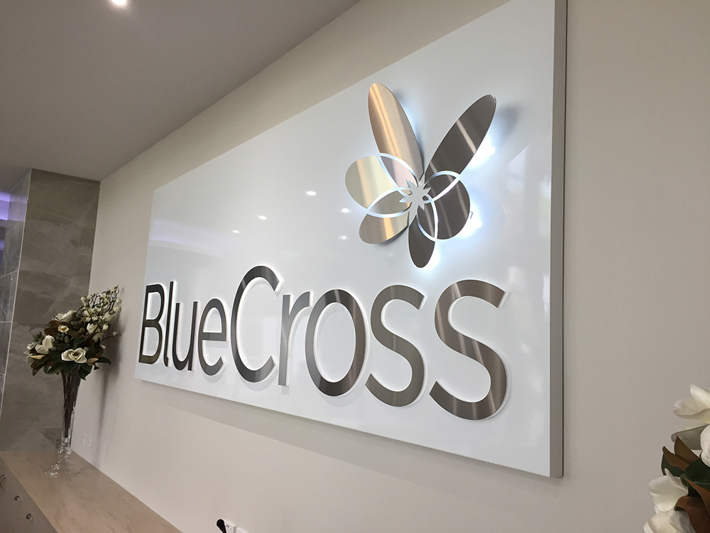 custom signage with lighting for reception area